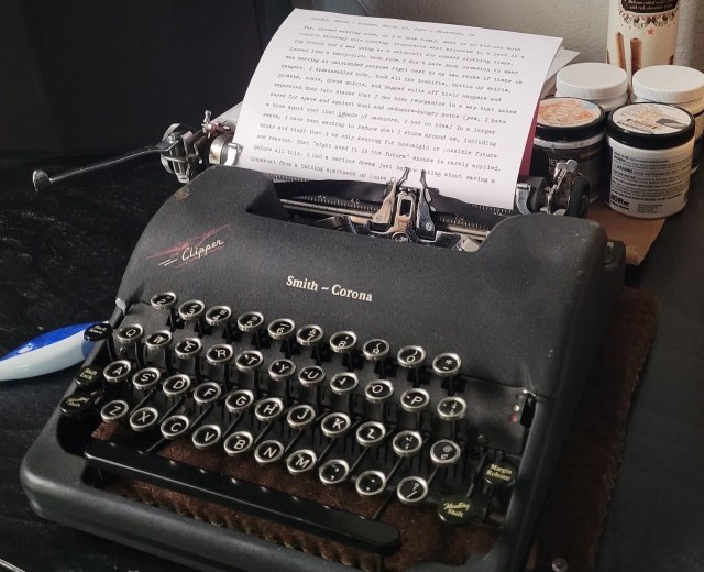Smith-Corona Clipper on a desk with a typed page